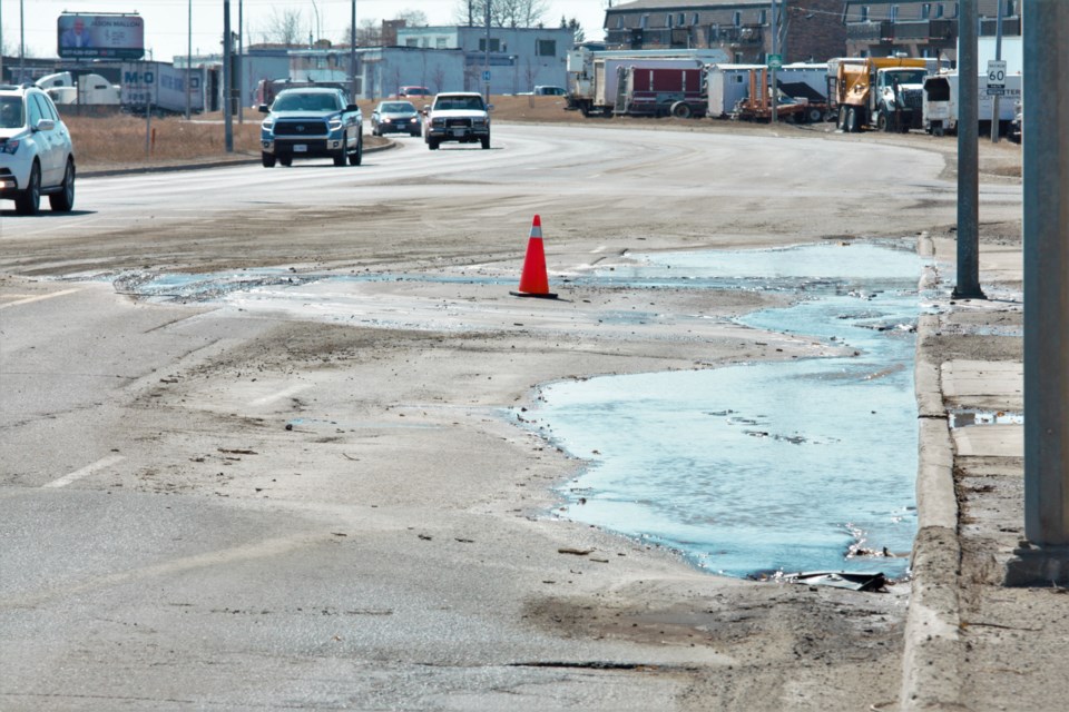 A water main break closed a section of Water Street Saturday afternoon. (Ian Kaufman, tbnewswatch.com)