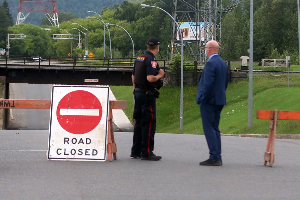 Police have closed off a section of James Street south of Gore Street, and the James Street Swing Bridge, on Tuesday, June 29, 2021. (Leith Dunick, tbnewswatch.com)