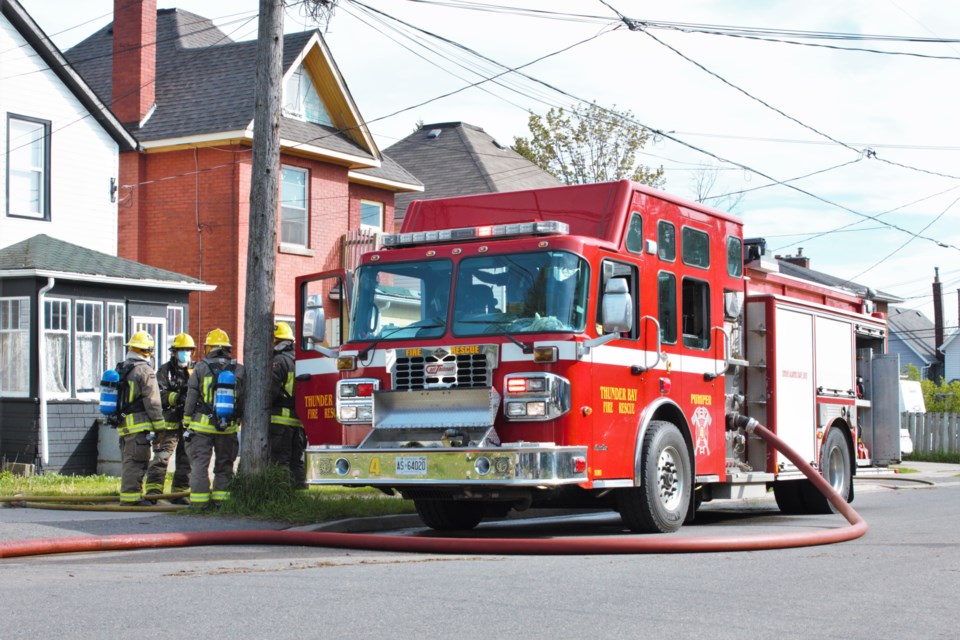 Firefighters extinguished a garage fire on Peter Street Tuesday evening. (Ian Kaufman, TBNewswatch)