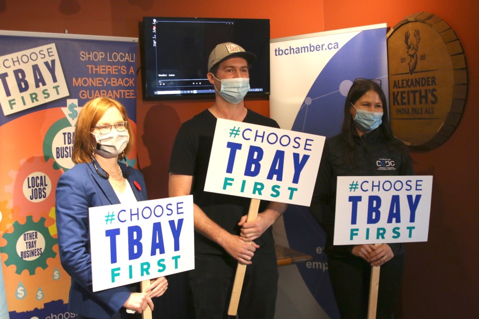 From left to right: Thunder Bay Chamber of Commerce president Charla Robinson, The Sal owner, Aaron Gillingham, and Thunder Bay CEDC project manager, Jamie Lee Yawney celebrate the launch of the #ChooseTBayFirst campaign. (Photos by Doug Diaczuk - Tbnewswatch.com). 