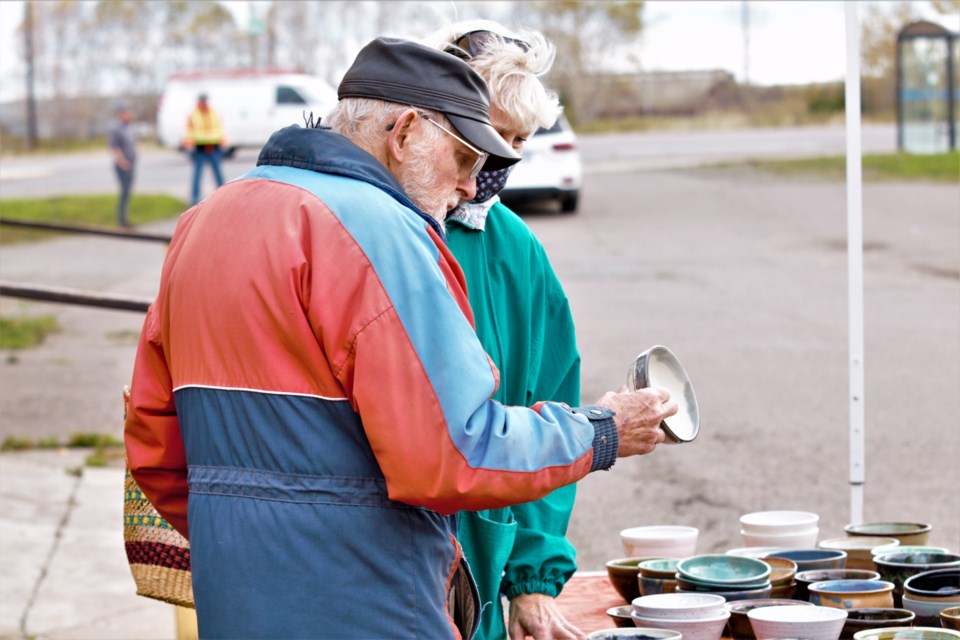 Alan Moon was one of 16 local potters who contributed work to the Empty Bowls, Caring Hearts fundraiser. (Photos by Ian Kaufman, TBNewswatch)