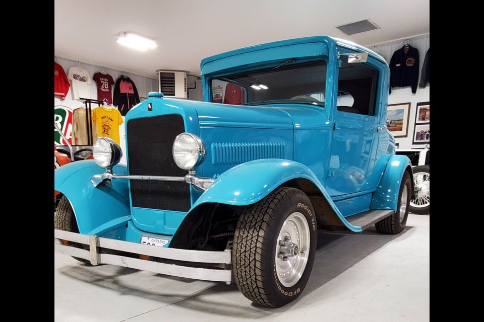 Russ's Garage features a collection of vintage automobiles and other items donated by Russ Wanzuk (Jean Mayo photo)