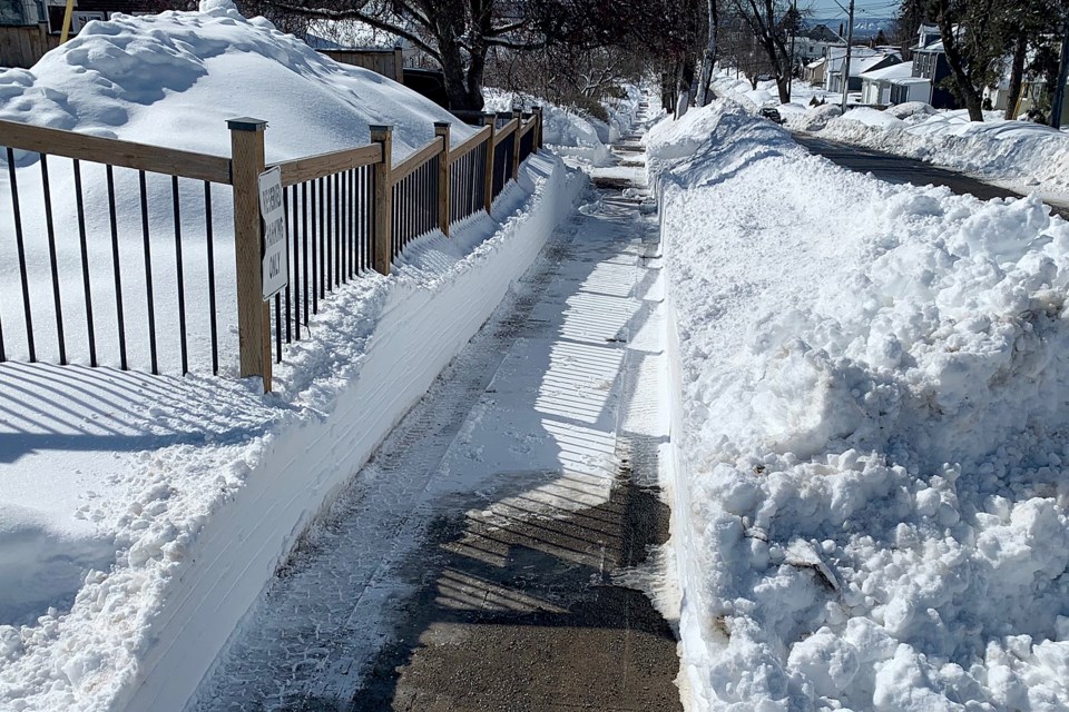 Snow cleared on sidewalk