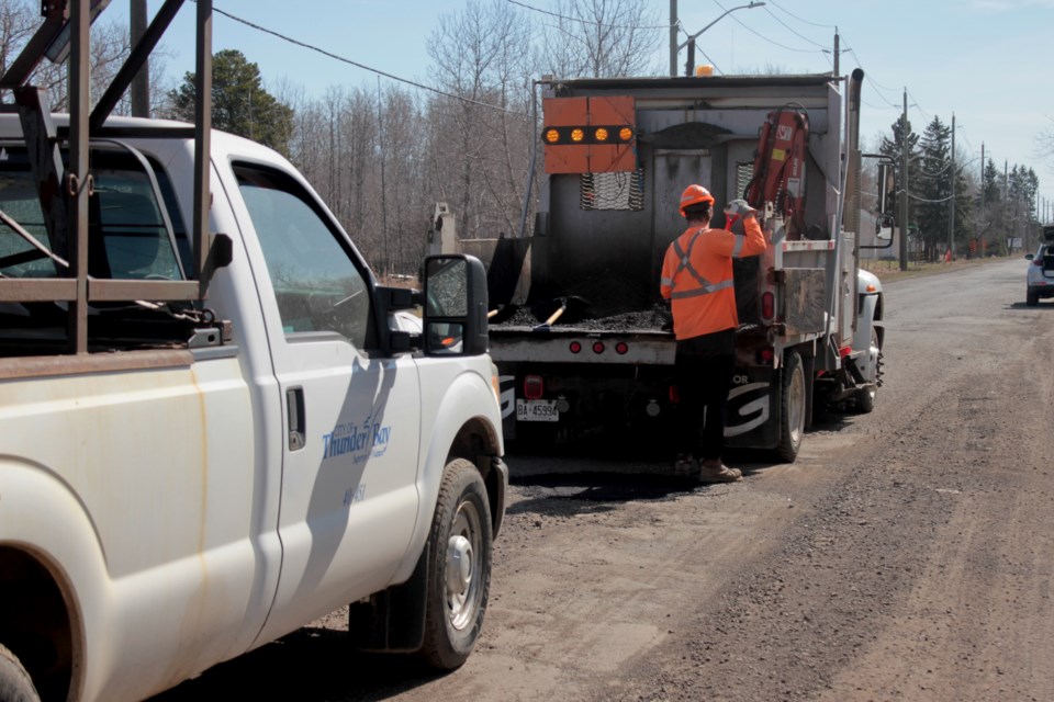 Crews got to work as soon as they could once hot mix asphalt became available to them