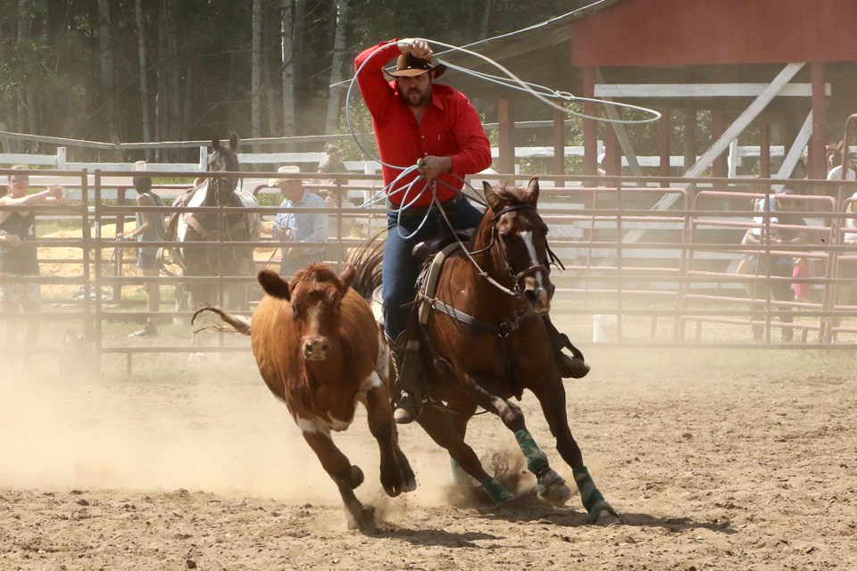 Kyle Sitch attempts to rope a calf at the Murillo Fair at the Murillo Fairgrounds from Friday, Aug. 19, to Sunday, Aug. 21, 2022. (Leith Dunick, tbnewswatch.com)