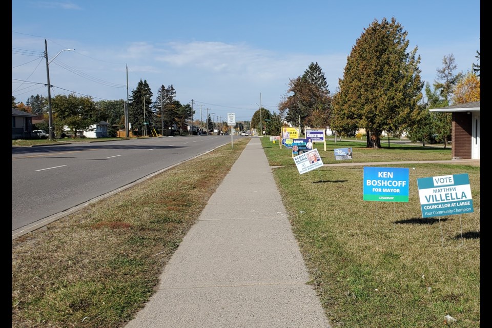 Numerous candidates' signs greet motorists and pedestrians along a stretch of River Street (TBnewswatch)