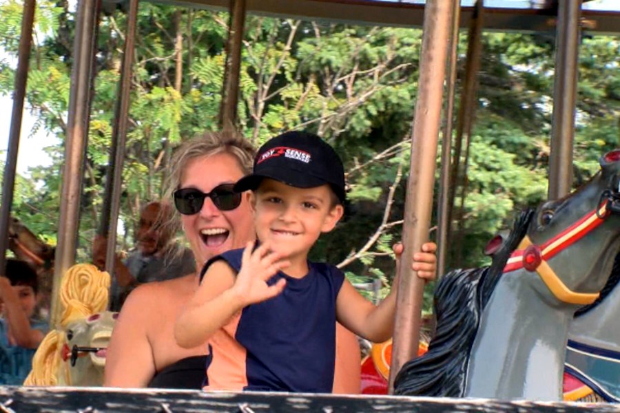 Families were thrilled to be able to ride the historic carousel again