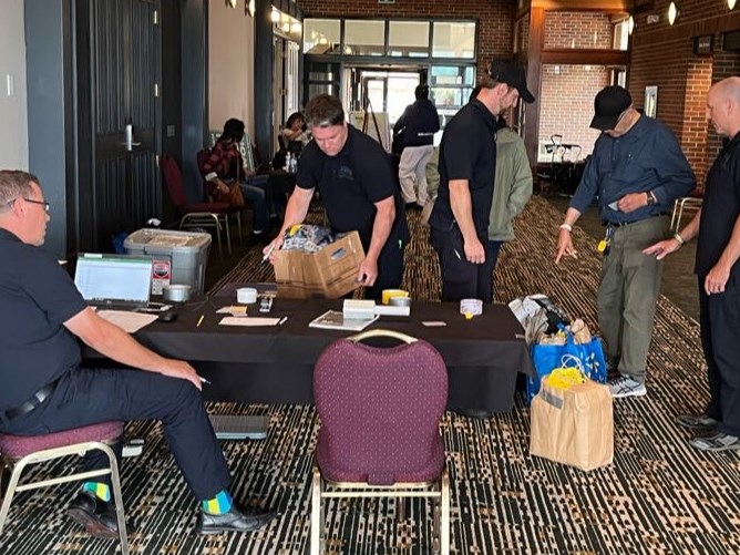 Checking Eabametoong First Nation evacuees in before departing for the airport August 1, 2023