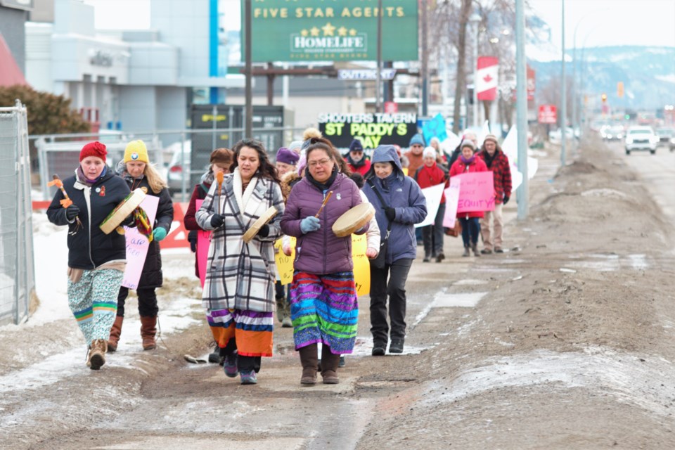 Around 50 people participated in an International Women's Day march on Wednesday, one of several local events marking the occassion. (Photos by Ian Kaufman, TBnewswatch)