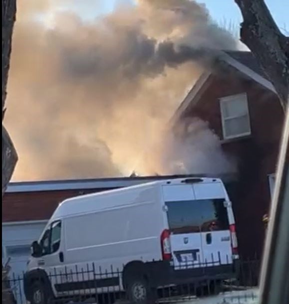 Thick smoke billowed into the air when fire broke out on the exterior of a home on Ridgeway Street on Dec. 1, 2023 (submitted photo)