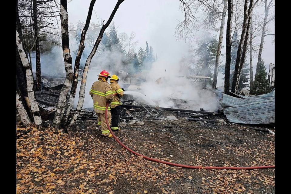 Shebandowan firefighters work at the scene of a fire that broke out Tuesday morning (Facebook/Shebandowan Shores Resort)