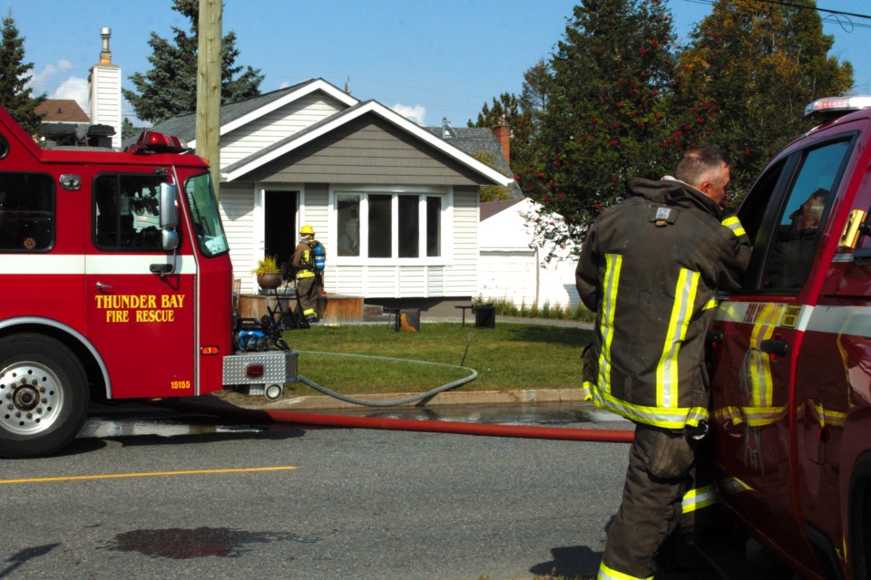 Firefighters respond to a fire on Gordon Avenue on Thursday. 