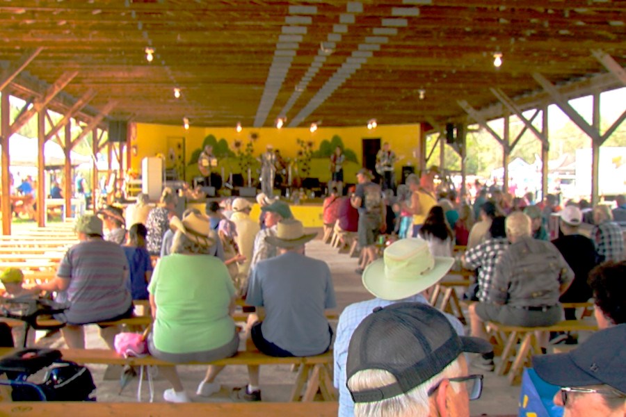 The fair featured numerous activities for kids, many exhibits, shows, markets, food, music, bingo, and competitions like the nail driving contest.