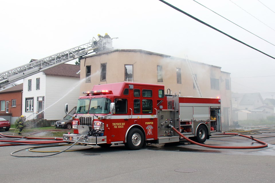 Thunder Bay Fire Rescue crews battle a fire at an apartment complex on the corner of McLaughlin and Christie streets in the city's East End. (Leith Dunick, tbnewswatch.com)