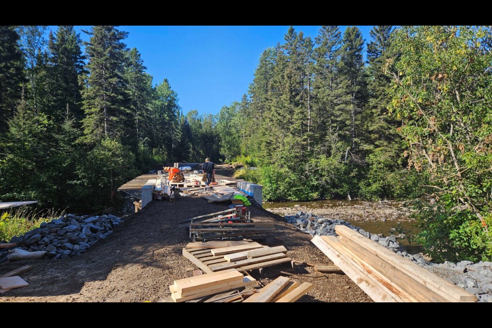 The bridge will allow users to cut through the park and trail system rather than walk around Junot Avenue and Golf Links Road. 