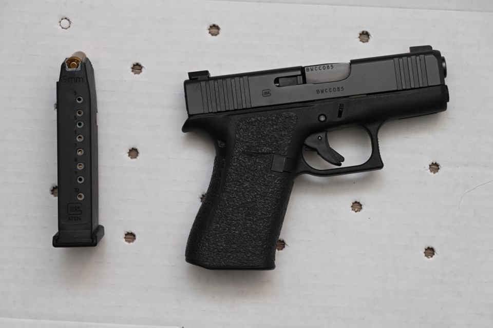 A gun was seized by police during multiple search warrants executed on July 30, 2024. 