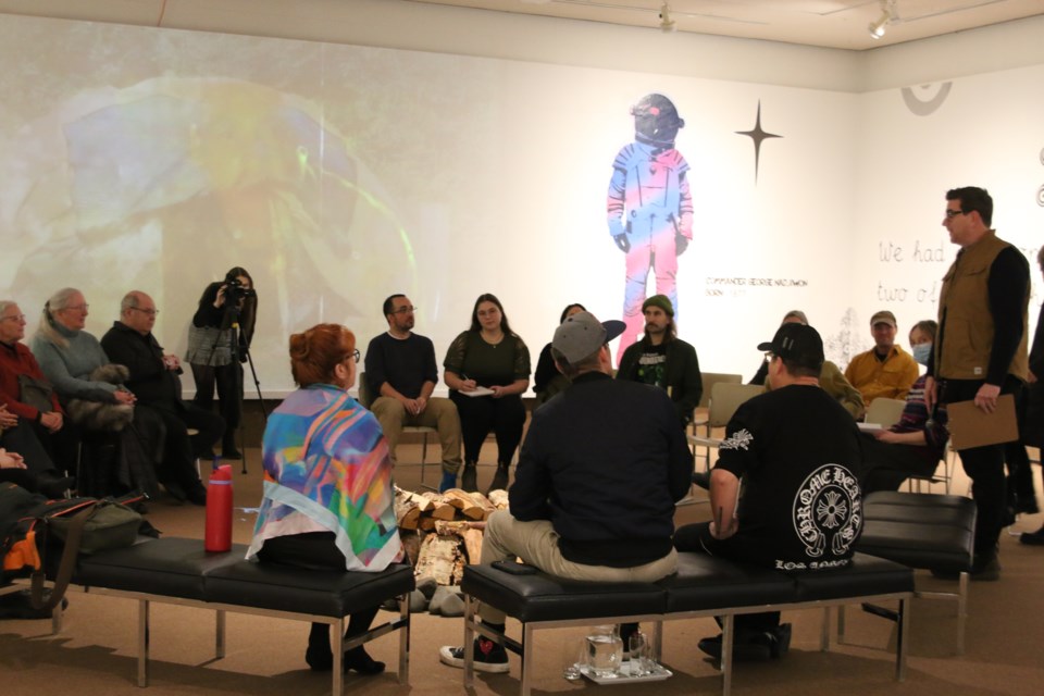 Locals visit and participate in the first conversation for the Gaganoonidiwag: They Talk to Each Other exhibition at the Thunder Bay Art Gallery on Jan. 11.