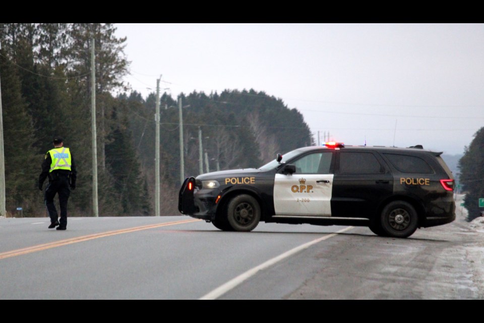 Members of the Ontario Provincial Police redirected traffic on Highway 11/17 after it was closed due to a weapons incident on Dec. 26.