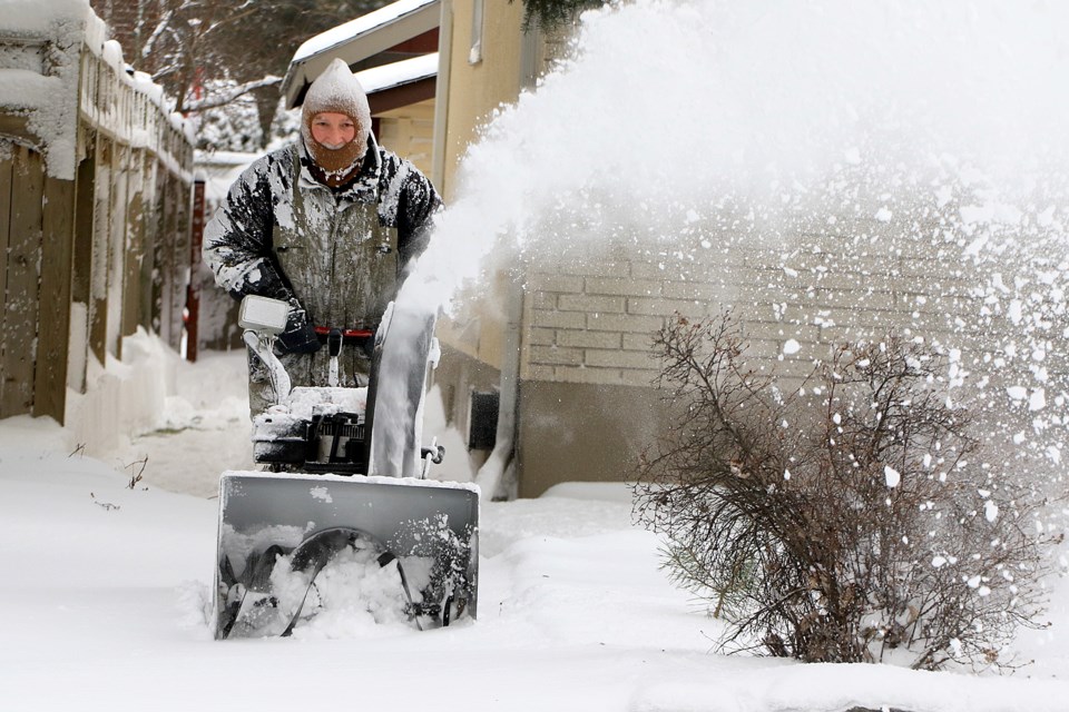 Ron Moro on Monday, Dec. 9, 2024 says he doesn't mind clearing snow from his driveway. (Leith Dunick, tbnewswatch.com)