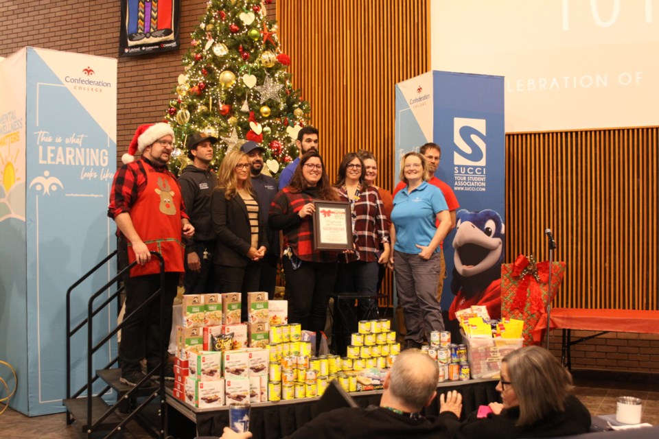 A group from made up of staff from the college's faculty services, best cleaners, wellness centre and security earned the most points for their combined fundraising and food donations in the large teams division