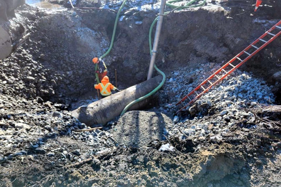 Crews work on a north side watermain