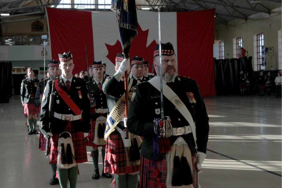 Lieutenant-Colonel J.G. Davis, CD. leads the regiment parade