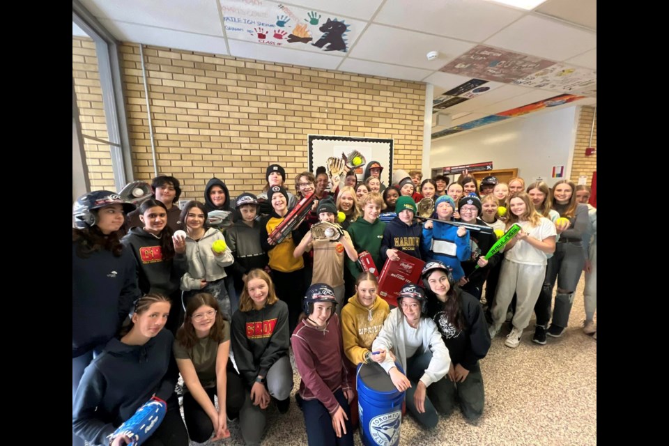 Students at École Gron Morgan photographed with their new baseball equipment from the Toronto Blue Jays, Jays Care Foundation.