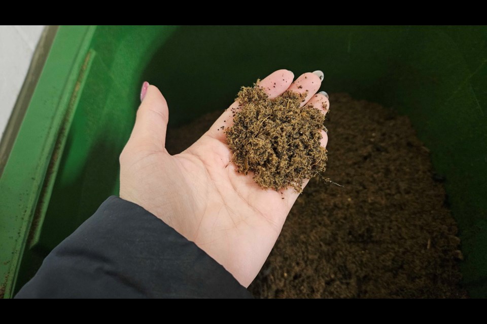 The mall's composter creates an end product that is very similar to peat moss in texture. 