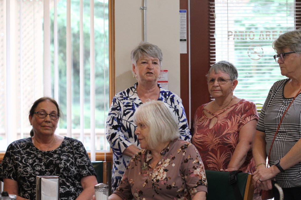 Unhappy about the activity fee increases, member Jean England (second from left) spoke at a meeting at the 55 Plus Centre on July 15, 2024. 