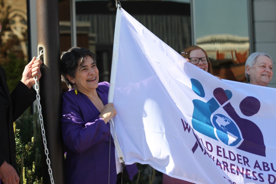 A flag was raised at City Hall on June 14, 2024 in recognition of Elder Abuse Awareness day