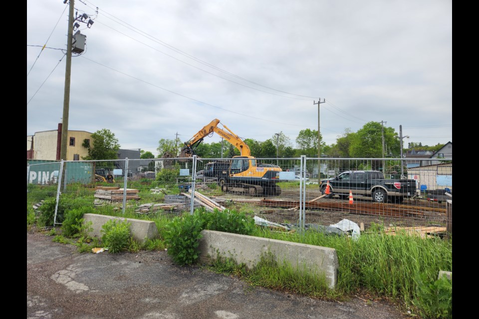 A small work crew with a backhoe was observed this week on the site of the former Finnish Labour Temple and Hoito Restaurant (TBnewswatch photo)