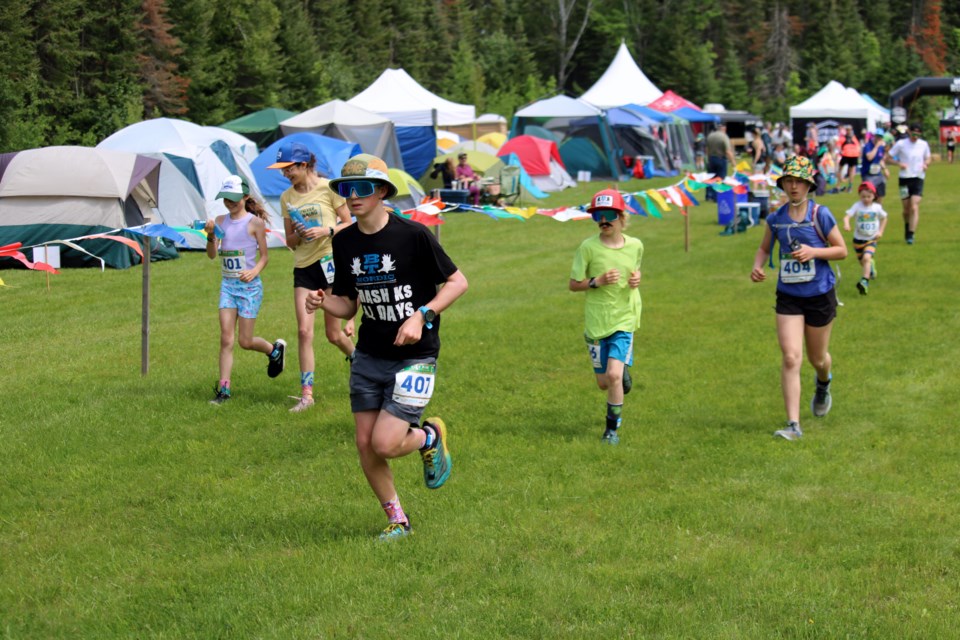 Oskar Berglund leads a group of youth runners as they started their four-hour timed event at the High Noon 24 Hour Trail Race and Relay.