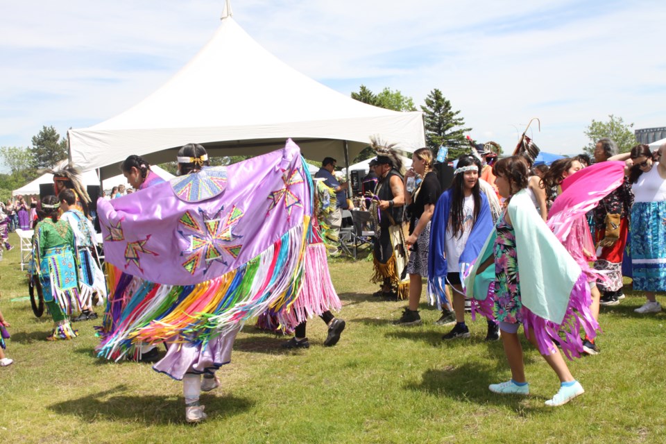 Several people dance on National Indigenous People's Day on June 21, 2024