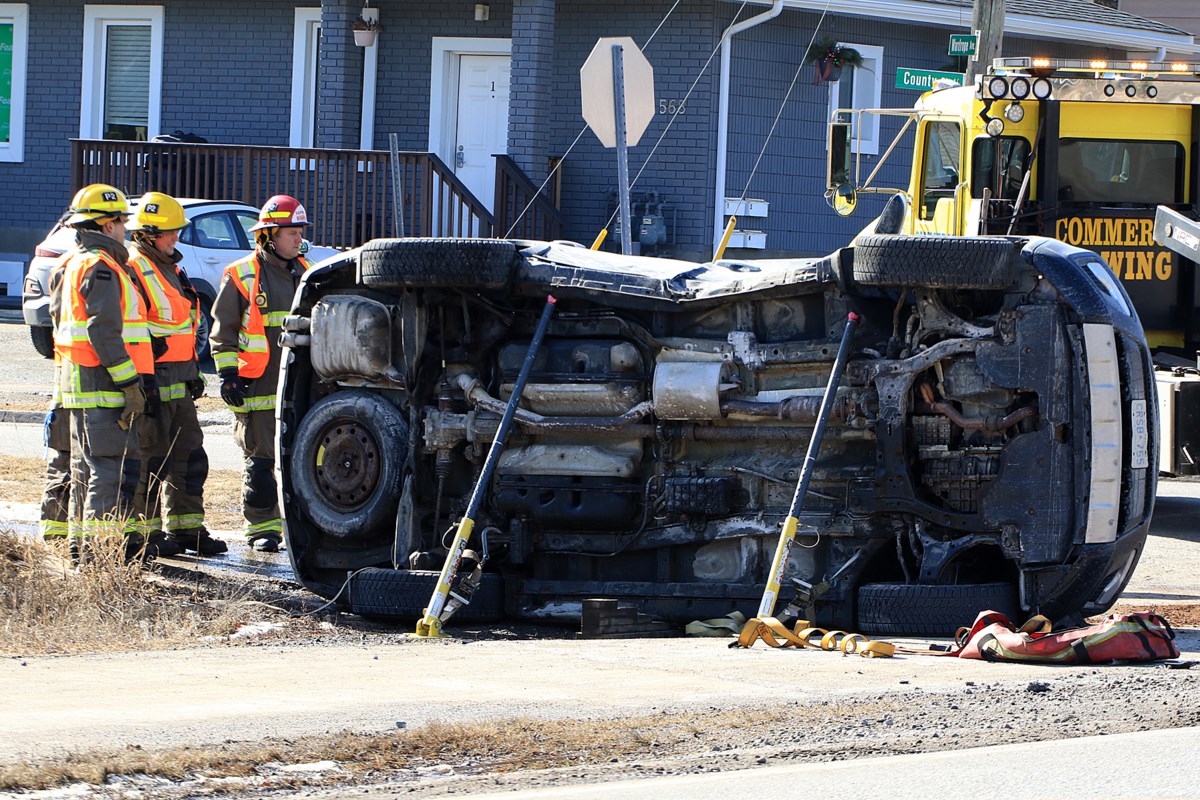 Collision Flips Vehicle On Its Side - TBNewsWatch.com