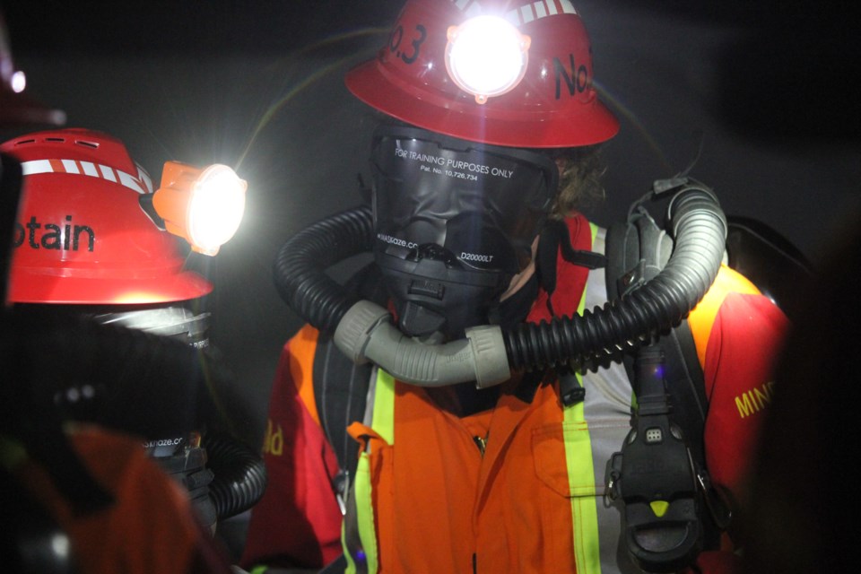Rescuers' face masks are blacked out during a competition. Their visibility is reduced to approximately six per cent. 
