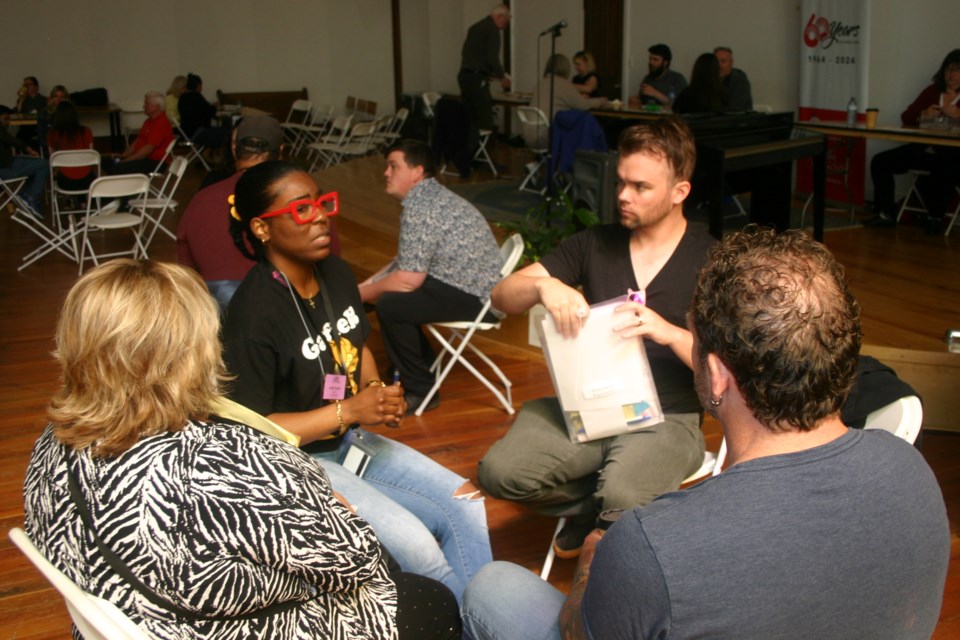 Janet Gilbart, from YES Employment, from left, Breanna Reid from the Elizabeth Fry Society, Daniel Russell-Matthews from Thunder Bay Literacy Group, and Coun. Brian Hamilton were some of the participants in the simulation. 