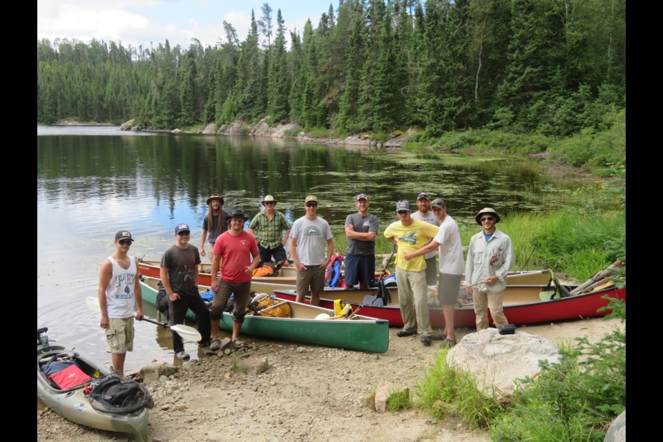 Members of the James Whalen 2.0 canoe team pose for a photo during a trip in Quetico Provincial Park. 