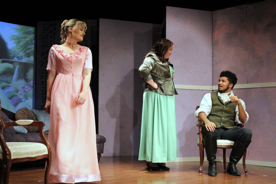 Cady Dreger, left, as Francine, Katie Maki as Eugenia and Austin Campbell as Thomas preform a scene from Of Marriage Minded Misses.