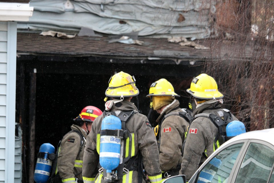 Firefighters believe a pail of ash left on the porch was the cause of a housefire on Dufferin Street, Nov. 28, 2024.