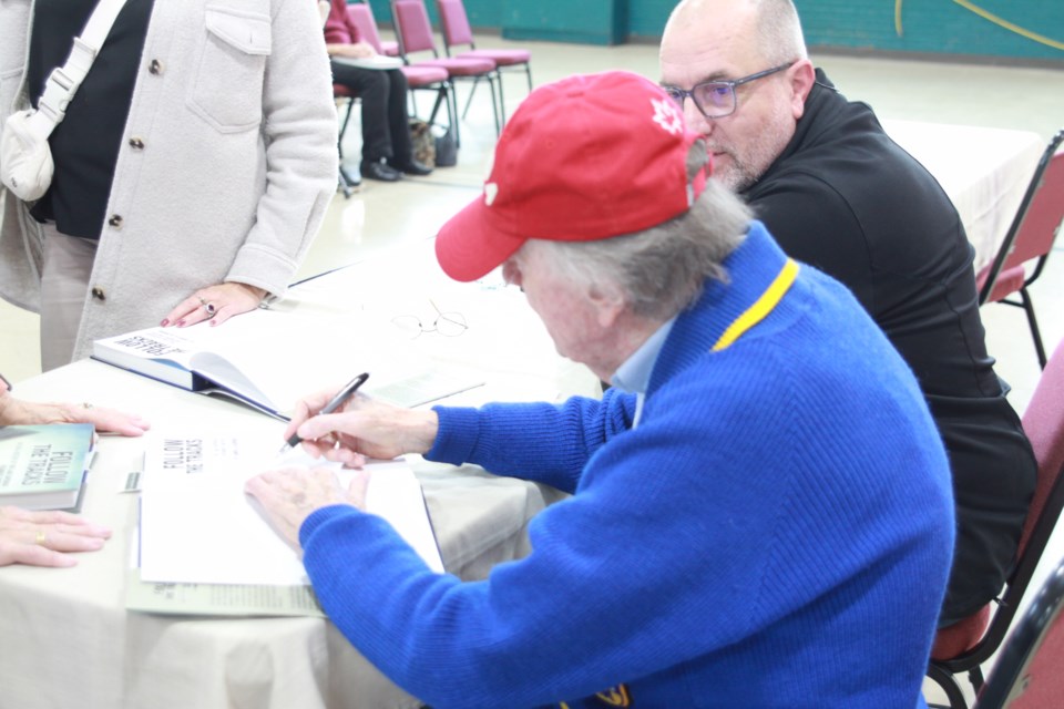 James Aldridge signing copies of his new book