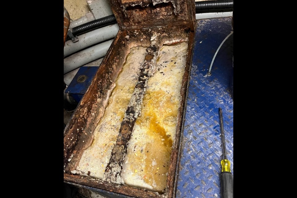 This photo shows a restaurant grease trap found to be at full capacity and out of compliance (City of Thunder Bay photo)