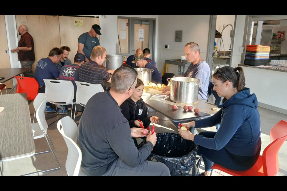 Firefighters preparing for Thanksgiving meal