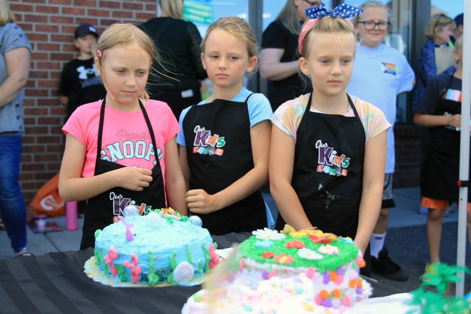 Kids were busy decorating cakes on Sunday, Sept. 29, 2024 at Carol's Cakes on Waterloo Street. (Leiht Dunick, tbnewswatch.com)