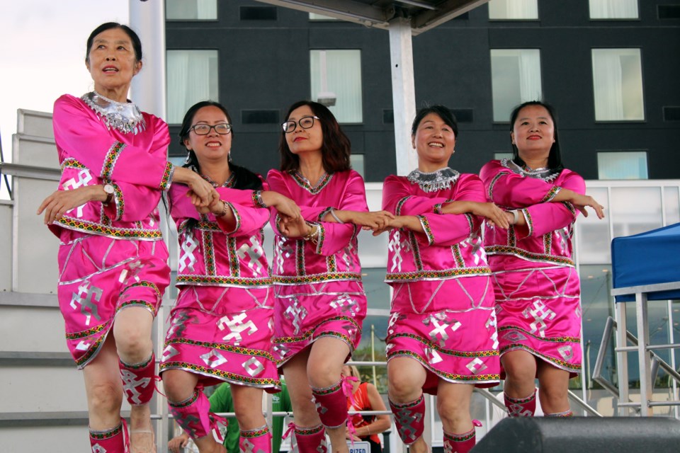 Members of the Thunder Bay Chinese Music and Dance Troupe perform at the Arts & Culture Under the Lights at Marina Park on Sept. 20. 