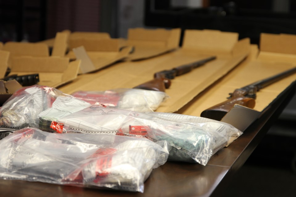 Police seized five guns in a recent investigation that's linked to over $200k in illicit drugs coming off city streets. 