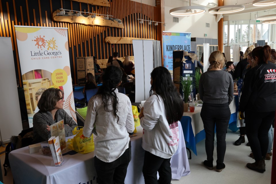 Confederation College Early Childhood Education students speak with service providers at a career fair in February 2025.