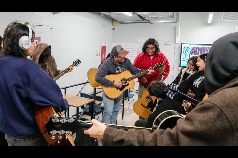 Greg Chomut (centre) has taught music at Dennis Franklin Cromarty High School for 17 years (photo by Sean Spenrath)