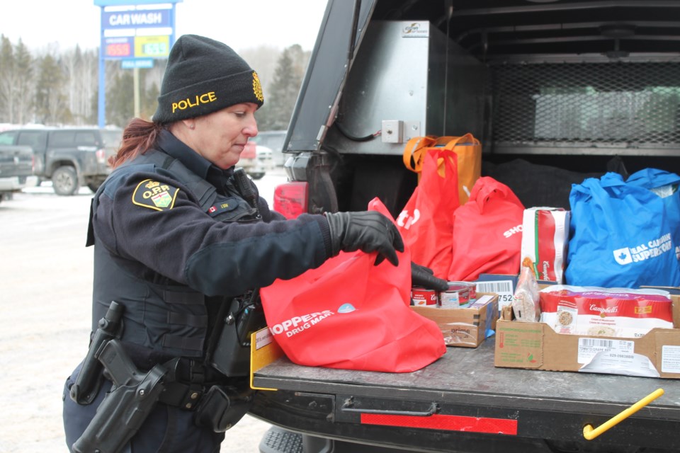 Const. Jodi Dow sorting through donations