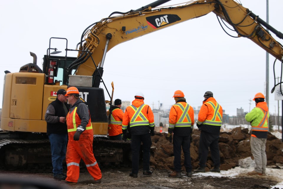 City of Thunder Bay workers undertake new digging on a second spot to locate the water main leak on Feb. 25.