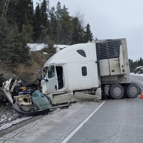 A Winnipeg man was charged with careless driving after a tractor-trailer struck a rock cut 60 km east of Kenora on Highway 17 on Mar. 11,2025 (OPP/Facebook)